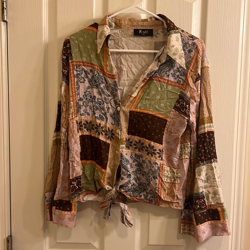Long sleeve top. From shop impressions. Size large. New without tags.